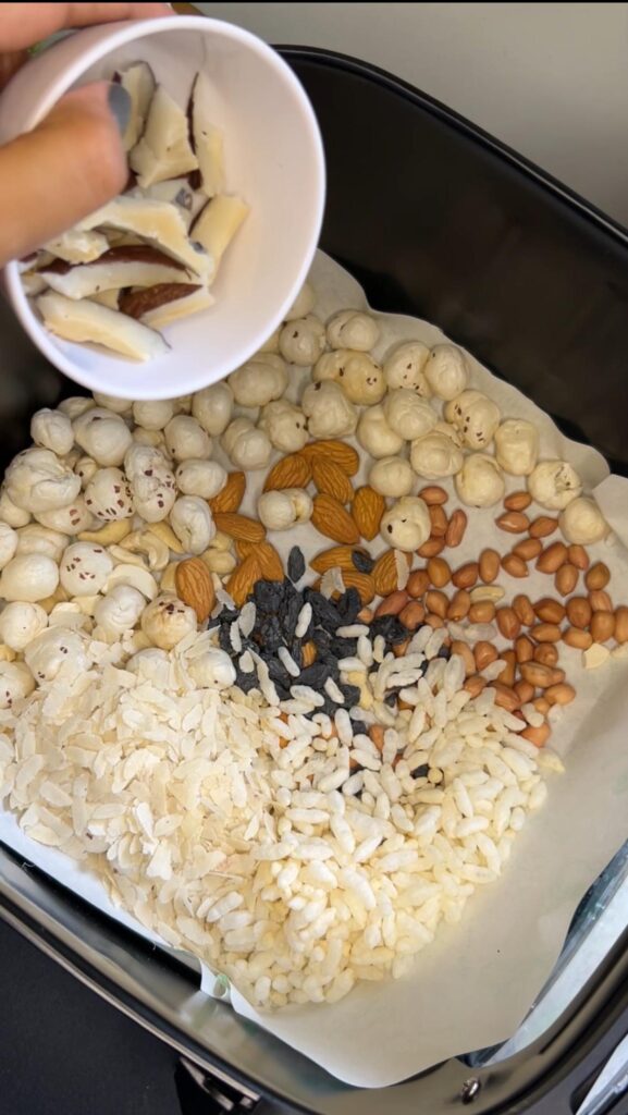 Easy homemade healthy trail mix recipe in a bowl on rustic table