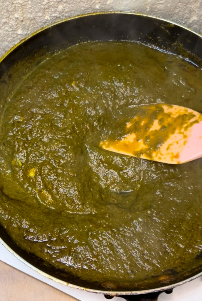 Close-up shot of creamy spinach tofu curry served with rice