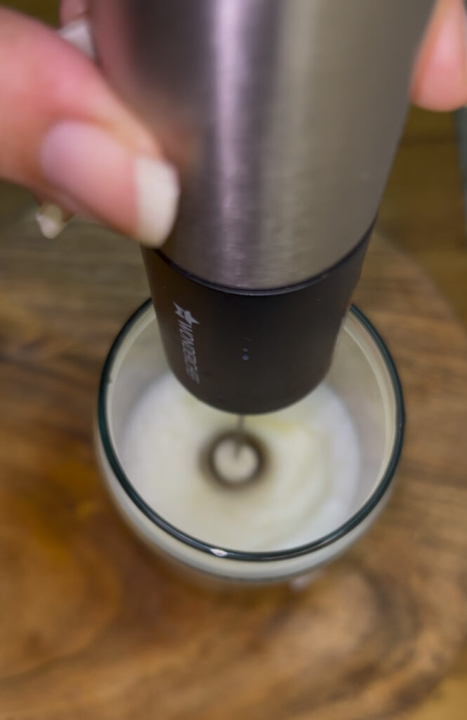 Step-by-step iced coffee preparation with fresh brew and milk