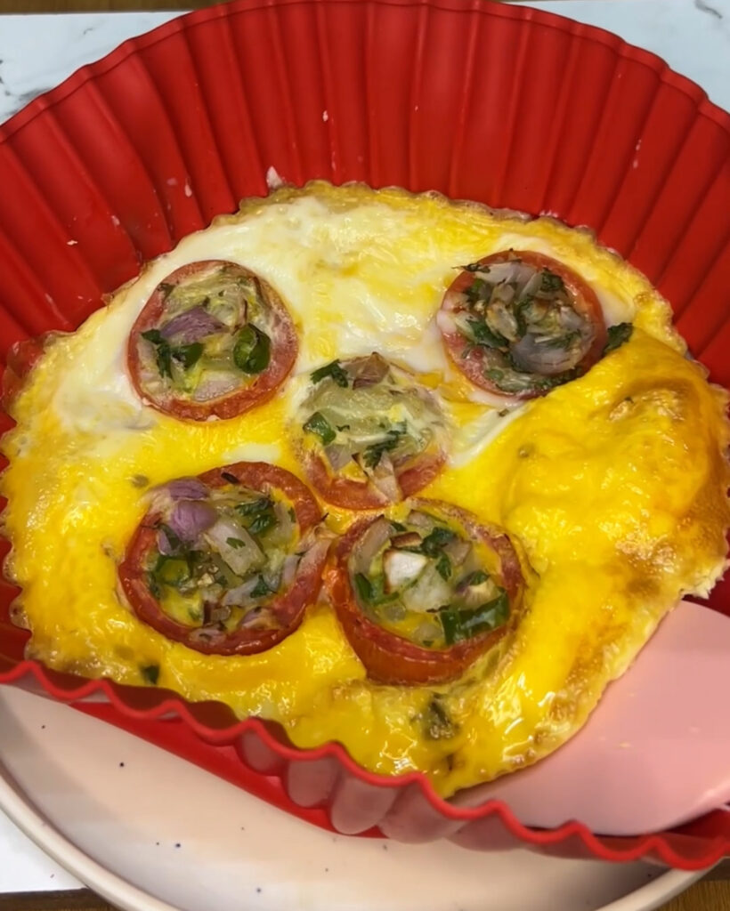 Cooking Spanish omelet in a non-stick pan on a stovetop