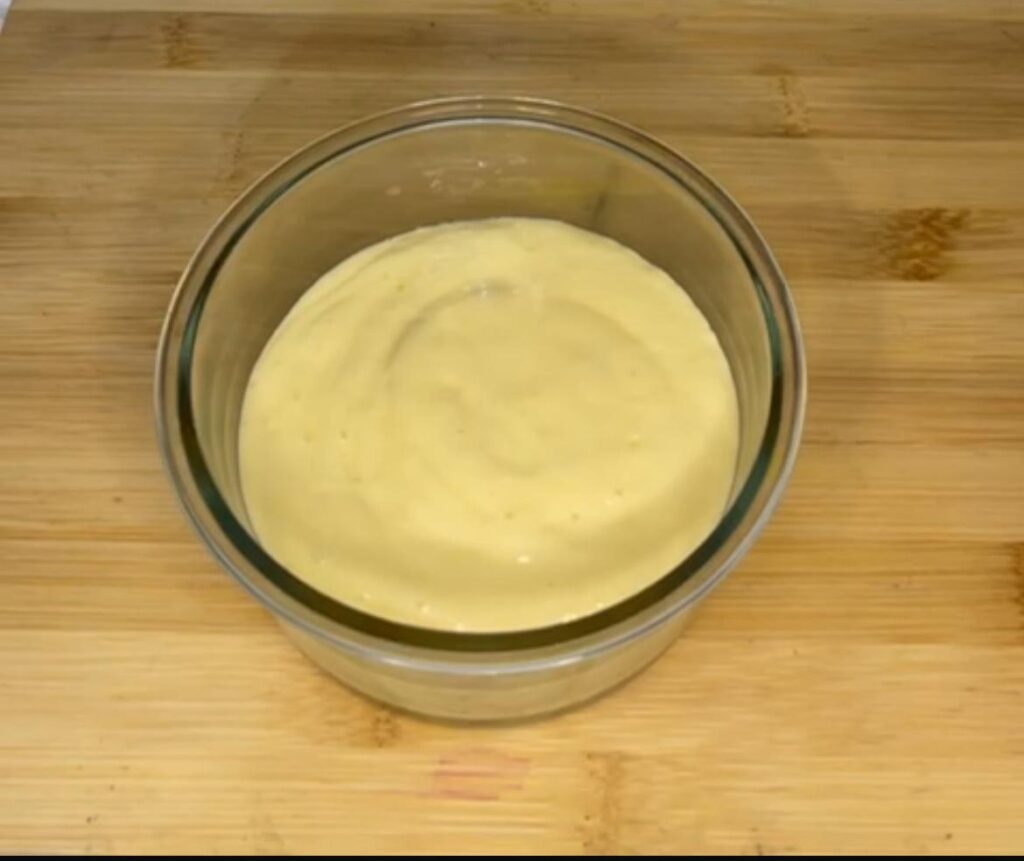 Overhead shot of homemade acai bowl recipe in a white bowl