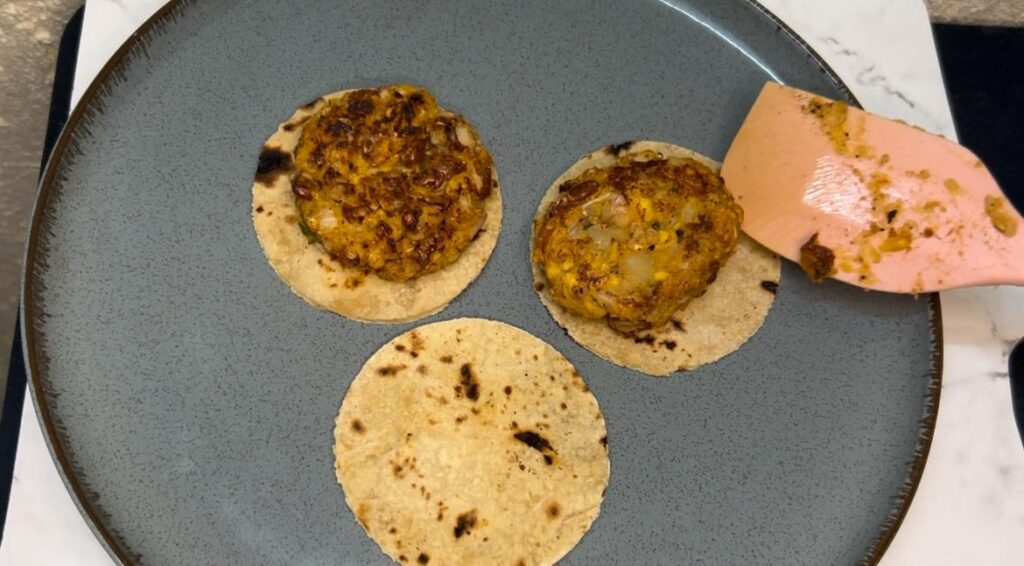 Fast-prep tacos made with black beans and corn, garnished with avocado