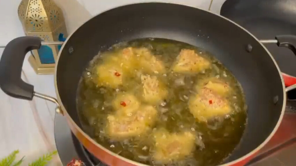 Garlic chicken wings garnished with parsley