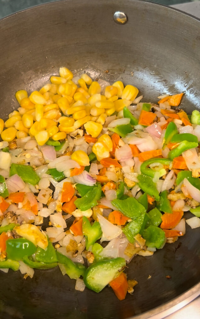 Close-up of fluffy vegetable rice cooked to perfection”