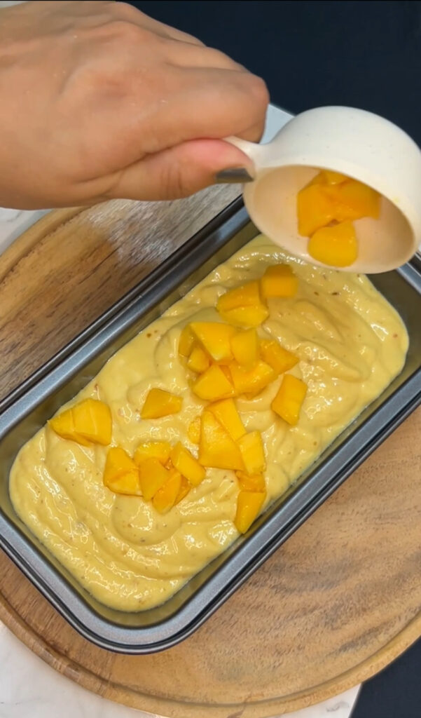 Delicious summer dessert mango ice cream close-up shot