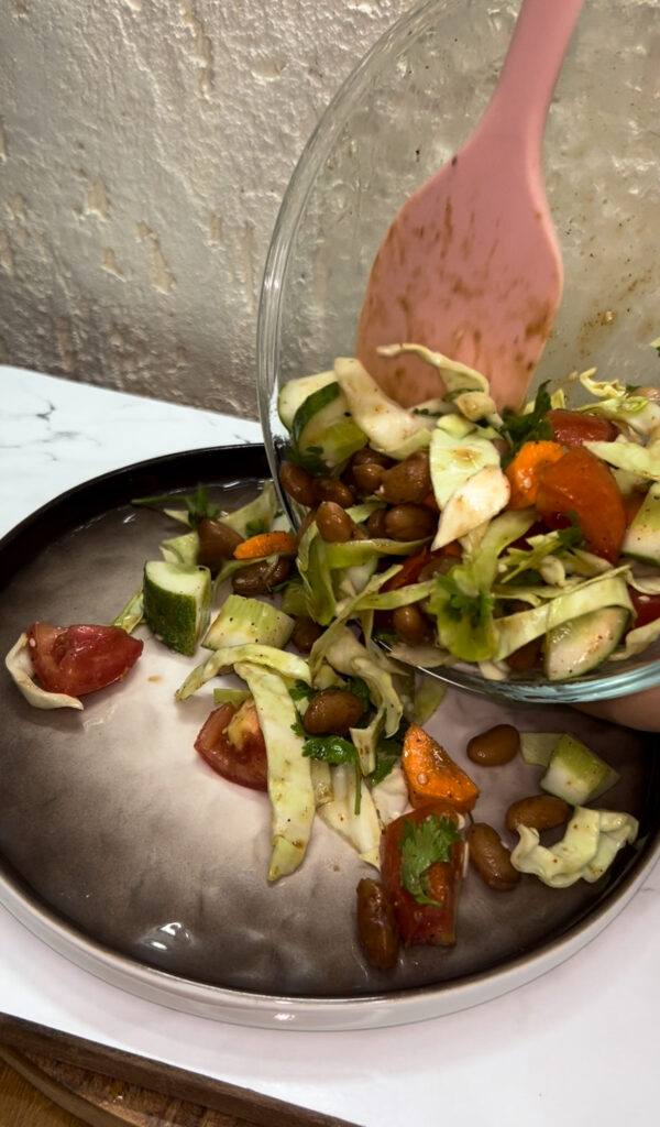 Close-up of kidney beans salad with vibrant ingredients and olive oil
