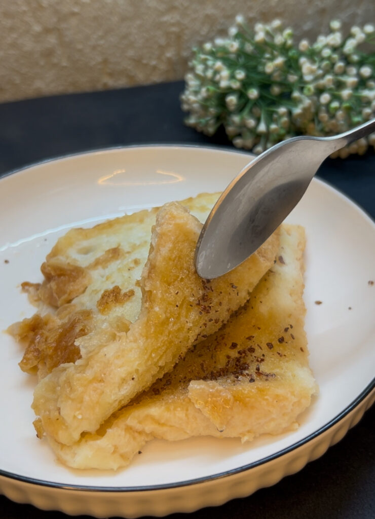 Homemade milk toast with a sprinkle of cinnamon