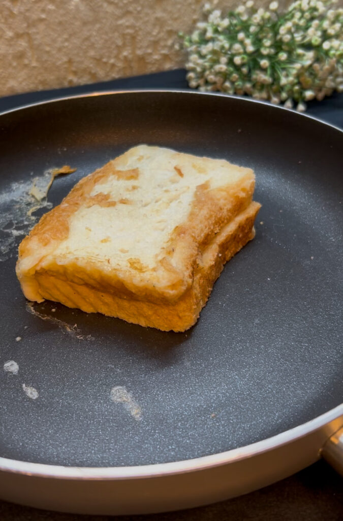 Close-up of thick, fluffy milk toast with butter