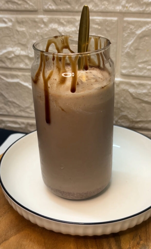 Decadent brownie milkshake dessert with ice cream and brownies