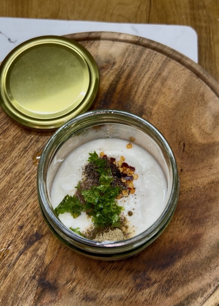 Healthy creamy cucumber salad with sour cream dressing