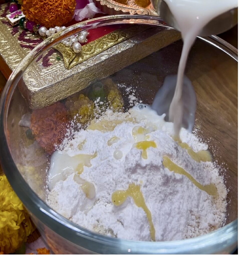 Close-up of freshly steamed Ukadiche Modak with ghee drizzle