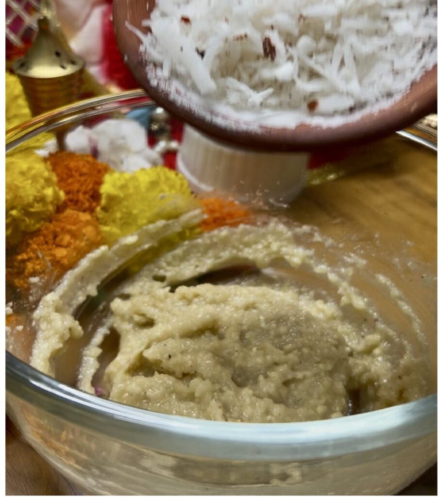 Close-up of freshly steamed Ukadiche Modak with ghee drizzle