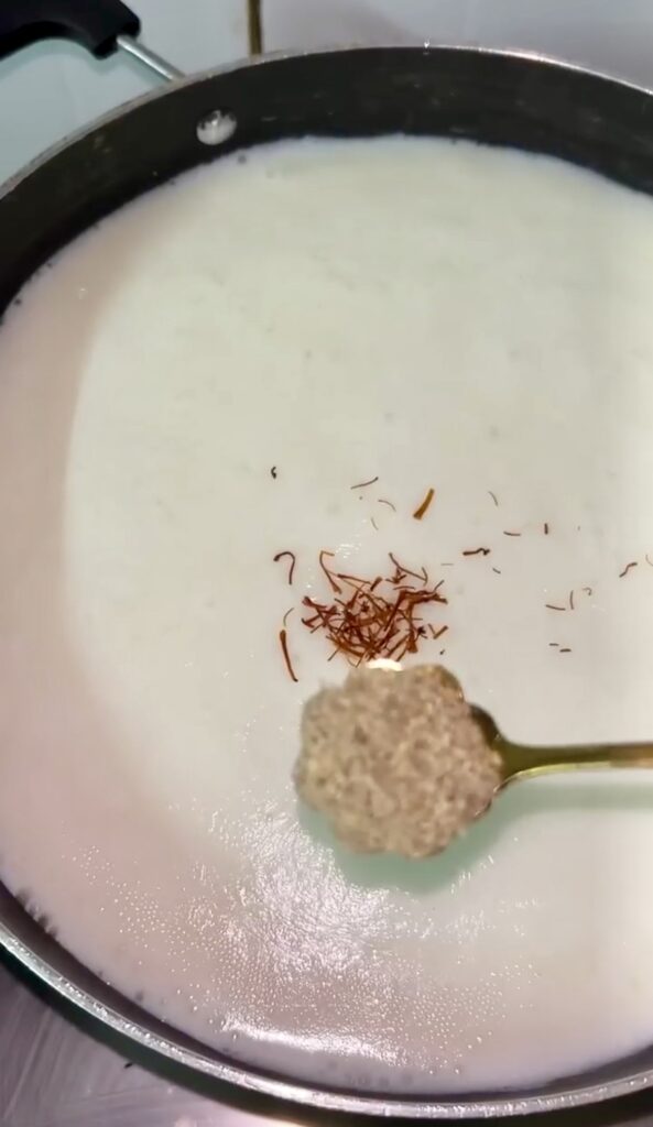 Close-up of cheesy dumplings melting inside broth