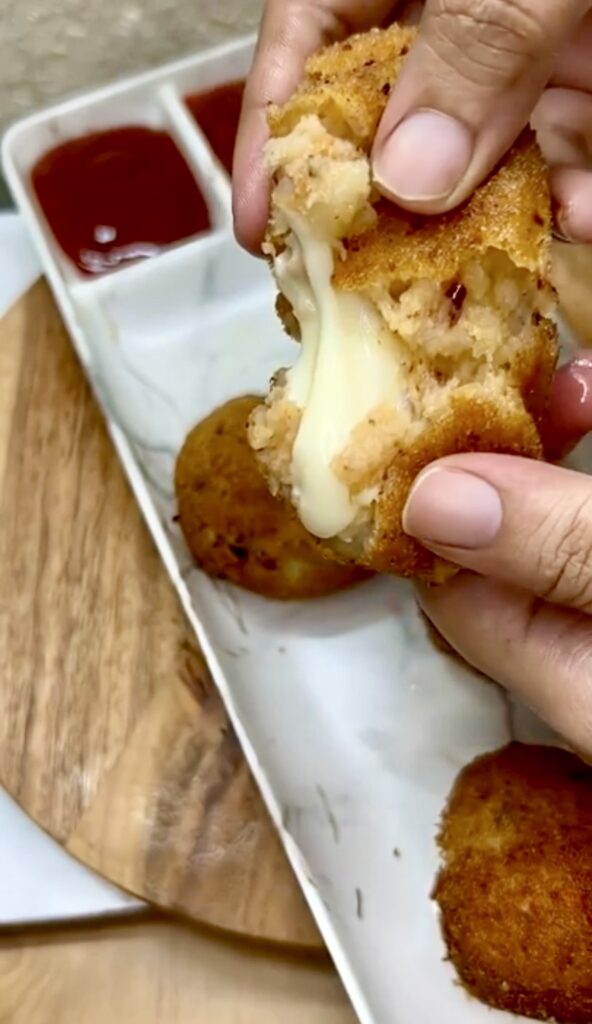 Easy homemade cheese balls garnished with fresh herbs