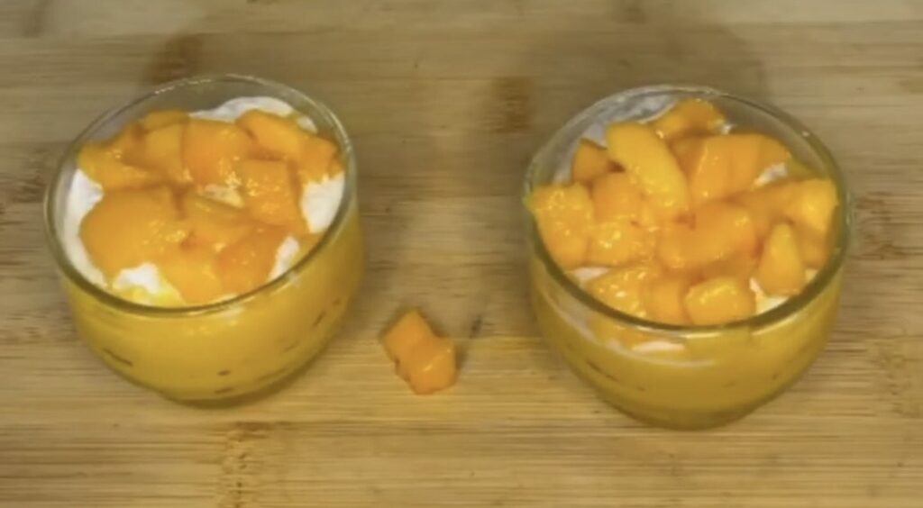 Refreshing mango pudding topped with diced mango and syrup