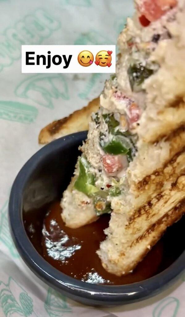 Healthy yogurt sandwich with cucumber, tomato, and herbs