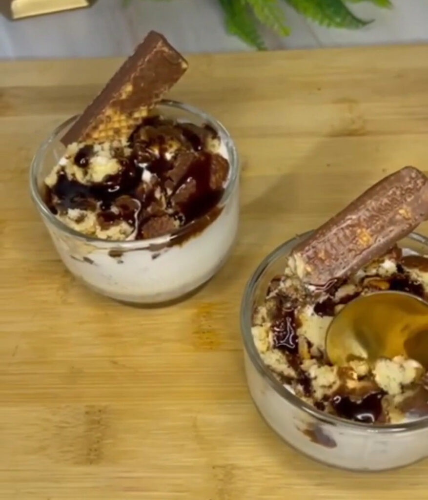 Rich chocolate dessert topped with whipped cream