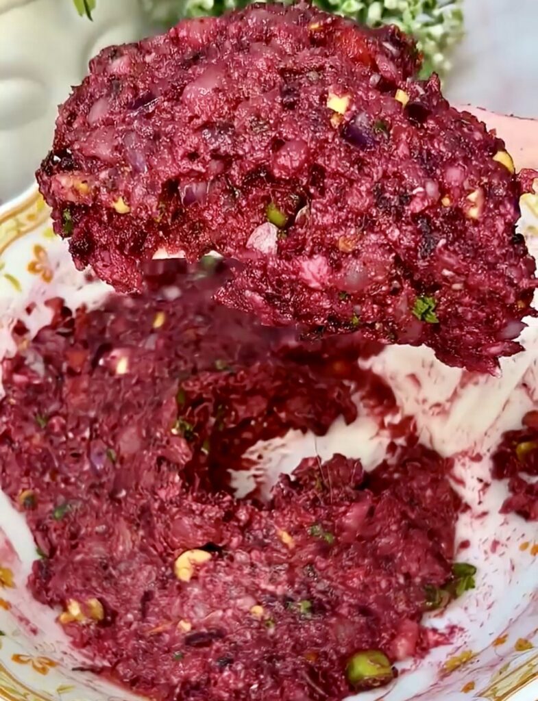 Beetroot skewers on barbecue grill with smoke rising